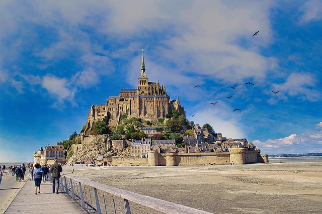 People on a pilgrimage to mont st. michel in France.